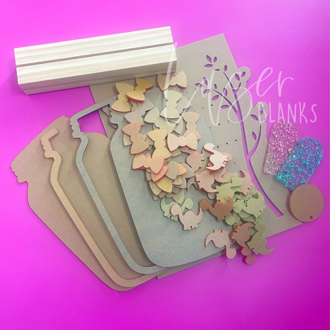 Laser Blanks May sample box contents spread on table