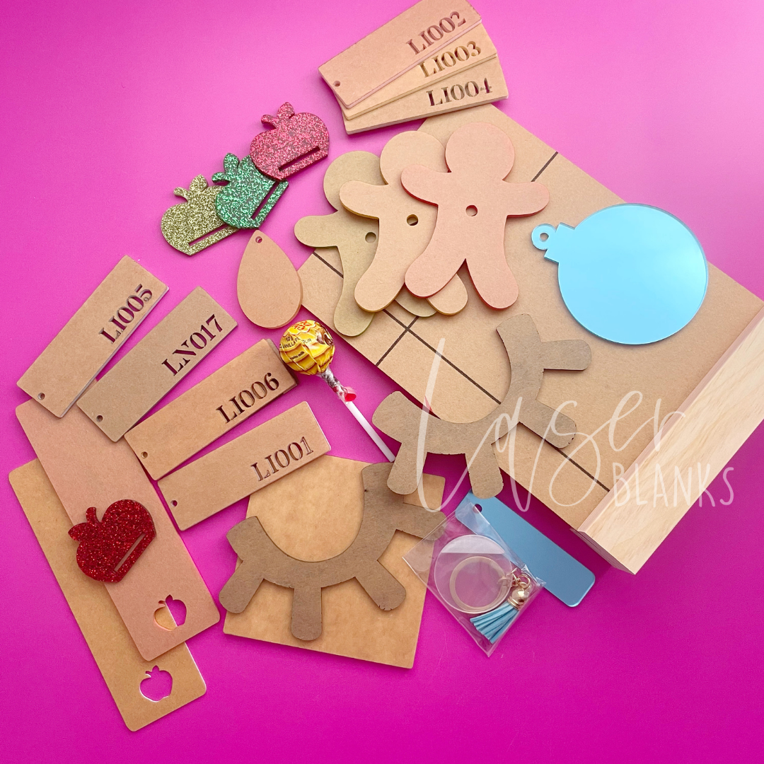 Creative craft supplies including bag tags and keyrings from sample box