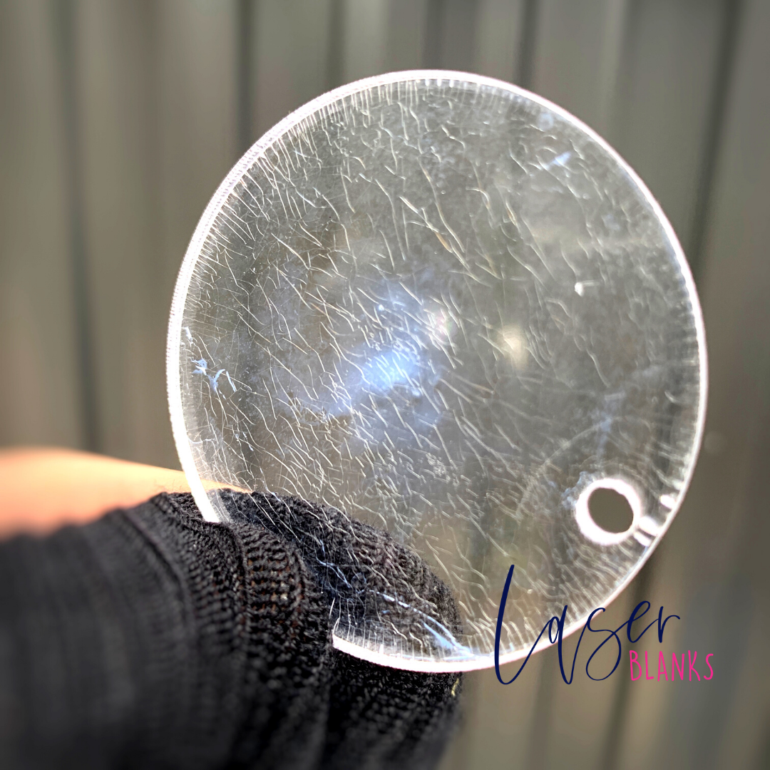 Close-up of acrylic with crazing damage caused by acetone cleaning