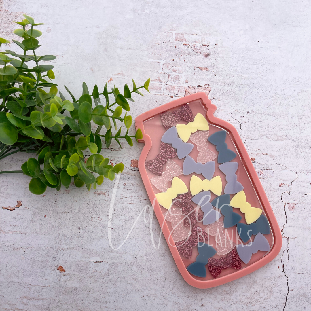 Laser-cut bow tokens compatible with reward jar systems